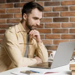 man-having-video-call-laptop